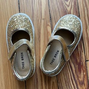 Girl sparkly slip on shoes.
